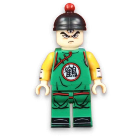 Ten Shin Han, le puissant guerrier des Z-Fighters, prend vie avec cette figurine LEGO de 15 cm, fidèle au manga Dragon Ball Z, pour les fans et collectionneurs.