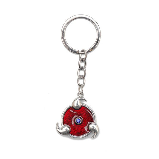 Donnez une touche Ninja à vos clés avec ce porte-clé Naruto métallique représentant le Sharingan triple, l'accessoire parfait pour les fans du manga !