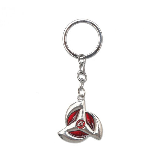 Donnez une touche Ninja à vos clés avec ce porte-clé Naruto en alliage de zinc représentant le Sharingan d'Obito, l'accessoire idéal pour les fans du manga !