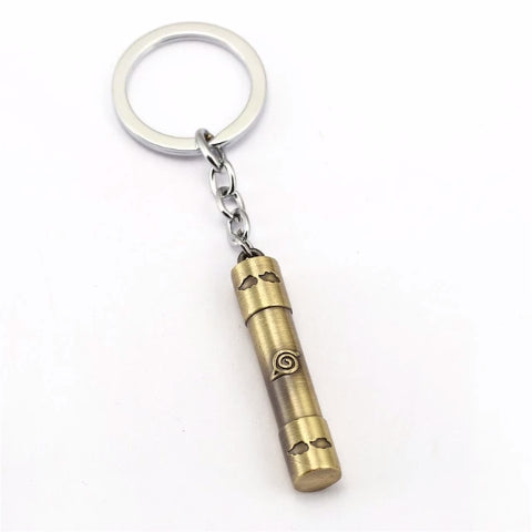 Donnez une touche Ninja à vos clés avec ce porte-clé Naruto métallique représentant le symbole de Konoha, l'accessoire parfait pour les fans du manga !