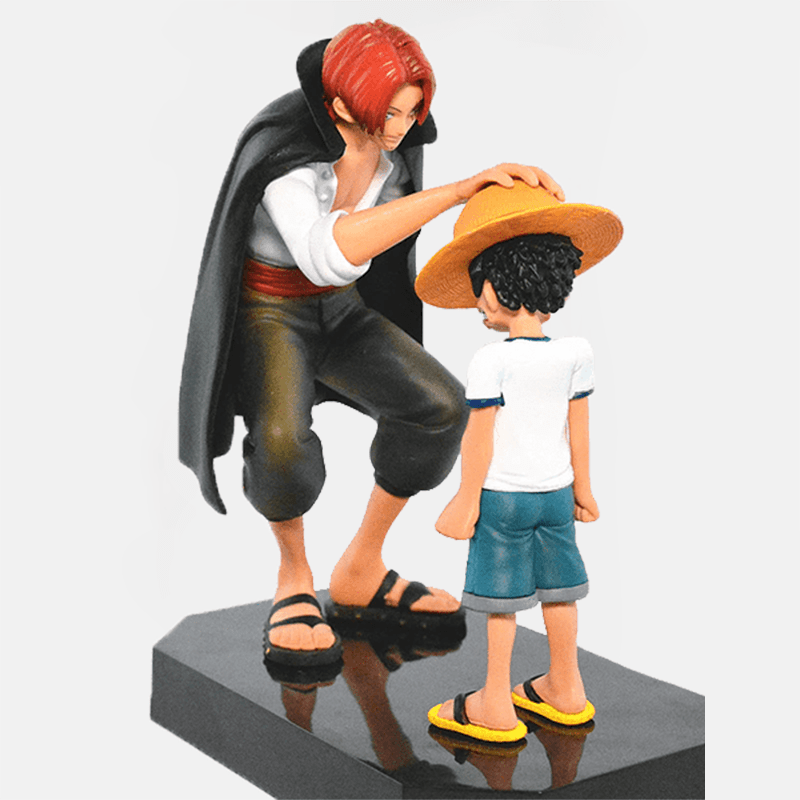 La Figurine One Piece Luffy et Shanks vous rappelle un moment inoubliable et vous invite à poursuivre votre quête pour devenir le roi des pirates.
