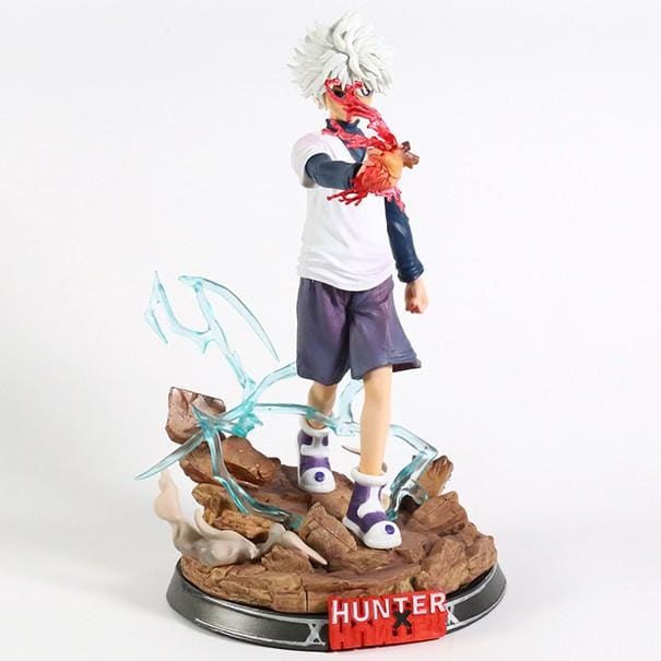 Figurine de Kirua Zoldik en tenue de combat, fidèle au manga Hunter x Hunter, 27 cm de haut.