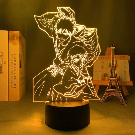 Lampe Bleach à l'effigie de Yachiru & Ichigo : 7 couleurs sans télécommande ou 16 avec, en acrylique durable et LED, de 20 cm, se branchant facilement par câble USB. Un incontournable pour les fans de Bleach !