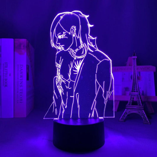 Illuminez votre espace avec la Lampe Tokyo Ghoul Uta, une lampe LED acrylique aux couleurs changeantes, parfaite pour les passionnés de Tokyo Ghoul, mesurant 20 cm x 15 cm avec une base alimentée par USB ou piles AA.